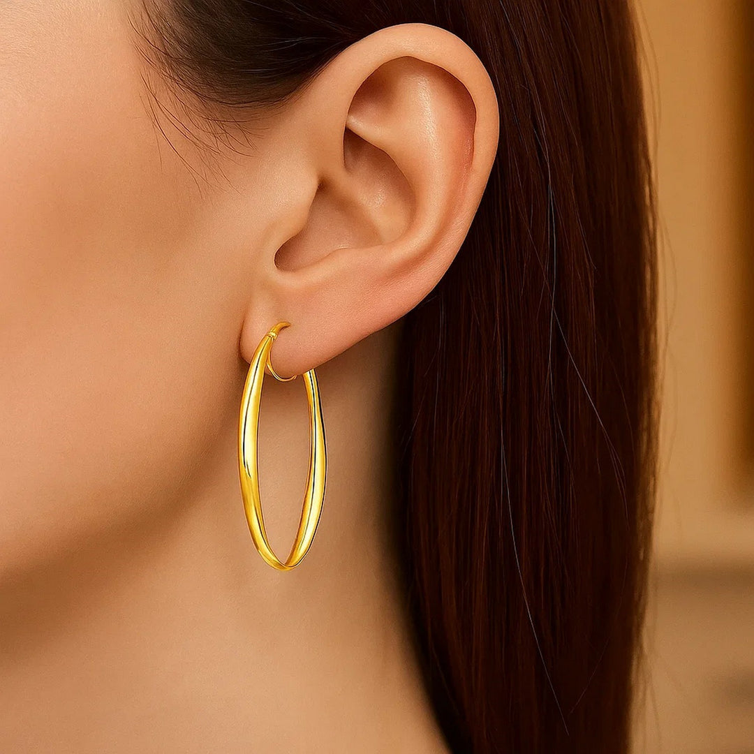 14k Yellow Gold Twist Motif Oval Shape Hoop Earrings
