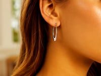 14k White Gold Polished Graduated Oval Hoop Earrings